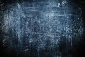Dark, textured surface with marks and scratches photo
