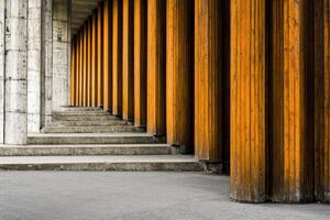Perspective of orange columns and concrete steps photo