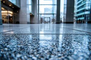 Polished granite floor in modern office building photo
