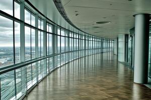Empty modern office corridor with panoramic city views photo