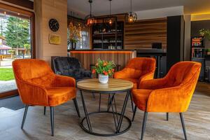Cozy Lobby with Orange Velvet Chairs photo