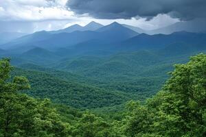 Lush mountain range under a cloudy sky photo