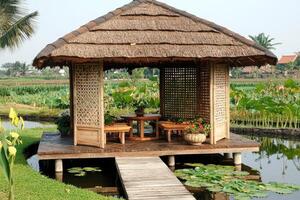 Tranquil Asian-style gazebo over water photo