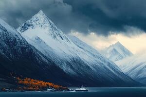 Majestic snow-capped peaks meet the stormy sea photo