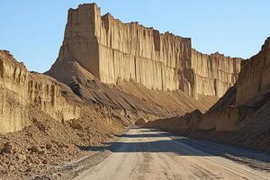 Desert Road Through Dramatic Cliffs photo