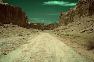 Dusty desert canyon road photo