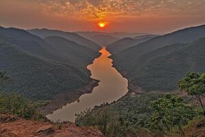 Sunrise over a valley photo