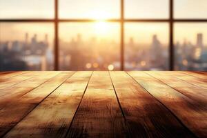 Empty wooden table in front of a city skyline at sunset photo