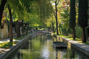 Picturesque canal lined with trees and greenery photo
