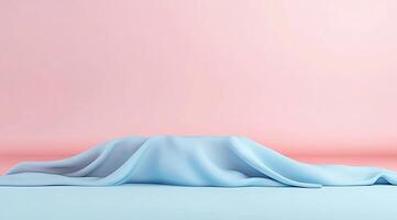 Pastel display podium draped in soft fabric photo