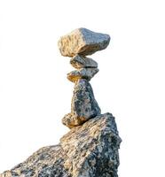 Balanced stones atop a peak photo