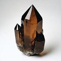A rich, amber-hued quartz crystal cluster, showcasing sharp, pointed terminations photo