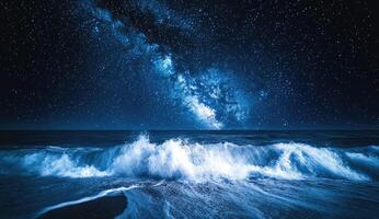 Night sky meets ocean waves photo