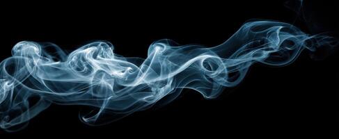 The graceful dance of smoke swirling against a dark backdrop photo