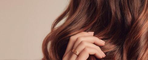 The elegant hairstyle with warm hues and delicate hand styling. photo