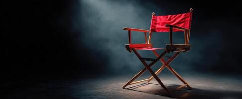 The iconic director's chair illuminated in a cinematic atmosphere. photo