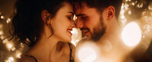The enchanting moment between a couple surrounded by soft, glowing lights. photo