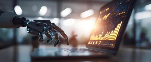 The futuristic robot hand interacts with a laptop displaying data analytics. photo