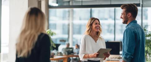 The engaging interaction of colleagues in a modern office environment photo