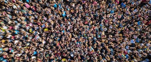 The Thriving Crowd At A Vibrant Outdoor Festival Celebrating Community And Unity photo