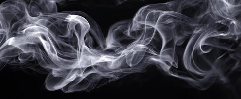 The elegant dance of smoke against a dark background in abstract form. photo