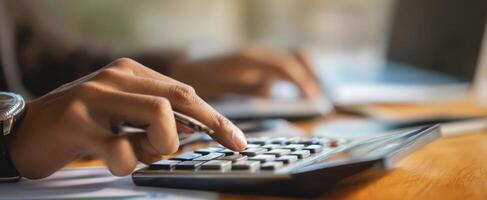 The calculator in use for detailed financial calculations and planning. photo