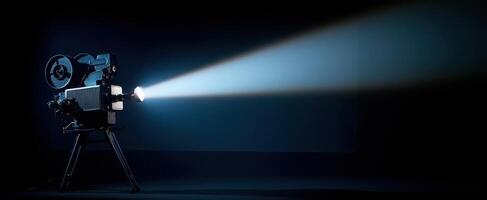 The classic film projector casting light into a darkened theater setting. photo