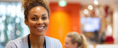 The smiling healthcare professional engaging with colleagues in a modern office setting. photo