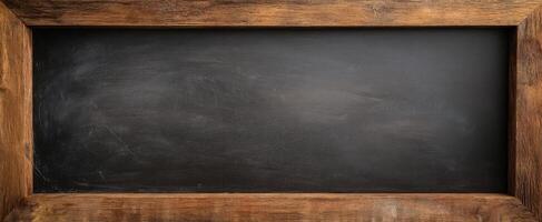 The rustic wooden frame surrounding a clean chalkboard surface for messages. photo