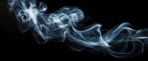 The ethereal dance of smoke against a dark background creating mesmerizing patterns. photo