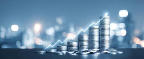 The coins stacked progressively showcasing financial growth and success trends. photo