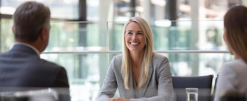 The successful woman engaging in a professional business meeting with colleagues. photo
