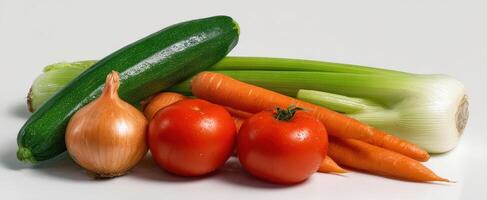 The vibrant assortment of fresh vegetables on a clean background. photo