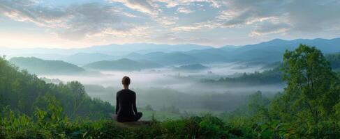 The serene meditation experience amidst the breathtaking mountain landscape. photo
