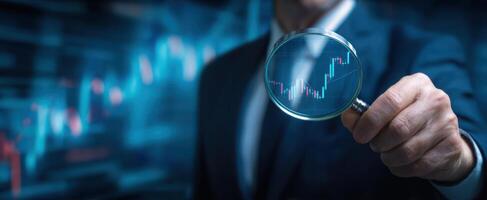 The Business Professional Examining Financial Trends Through a Magnifying Glass photo