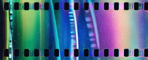 The vibrant colors of a film strip creating an abstract visual experience. photo