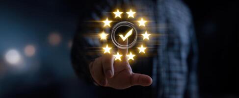 The approval process represented by a glowing checkmark surrounded by stars. photo