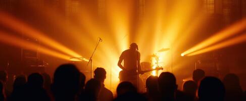 The musician captivating the audience with vibrant lights and energetic performance. photo