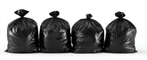 The four black garbage bags stacked neatly in a row on white background photo
