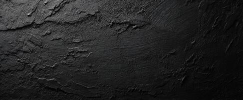 The textured black surface with a modern and abstract design. photo