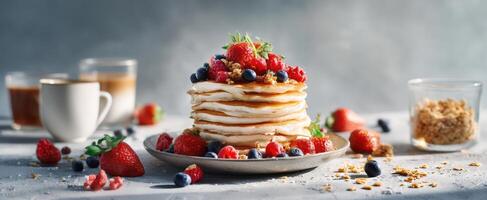 The mouthwatering stack of pancakes adorned with fresh berries and syrup. photo