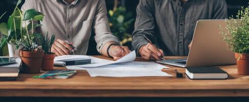 The collaboration of professionals analyzing documents in a modern workspace. photo