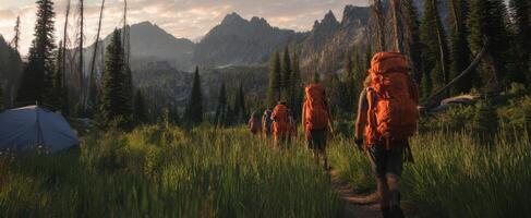 The adventurers trek through a stunning mountain landscape under the golden sunlight. photo
