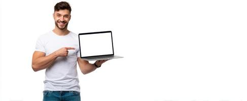 The smiling man promoting a blank laptop screen for marketing purposes. photo