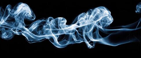 The Ethereal Dance of Smoke Against a Black Background photo