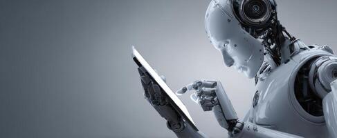 A robot holding a tablet computer in its hand photo