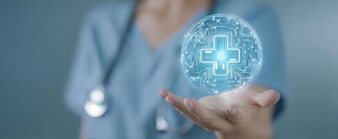 The healthcare professional holding a holographic medical cross symbol. photo