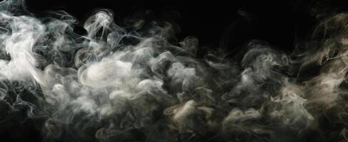 The swirling smoke creates an ethereal and mysterious atmosphere on a dark background. photo