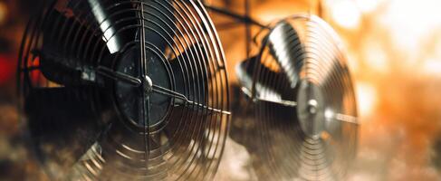 The industrial fans creating a cool breeze in a modern workspace photo