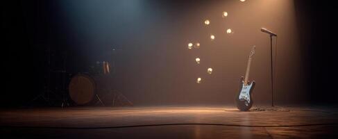 The guitar and microphone ready for a captivating live performance on stage. photo